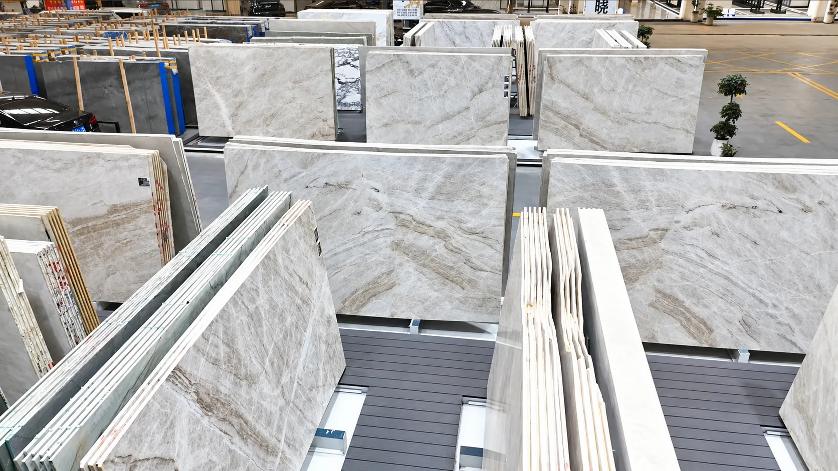Natural stone slabs in the supplied TAJSTONE showroom photograph